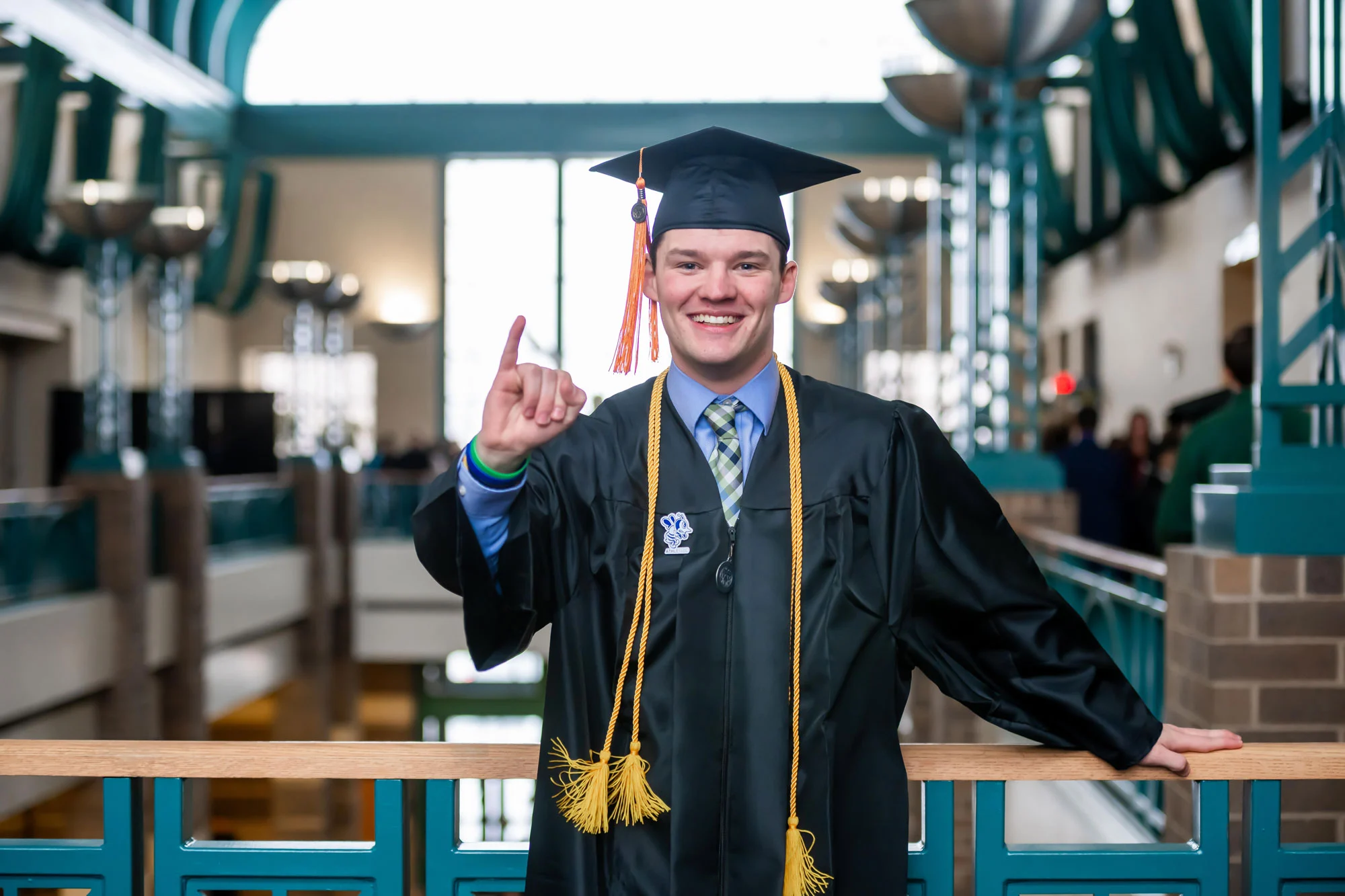 Student.Regalia.Happy